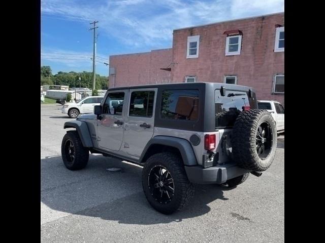 used 2015 Jeep Wrangler Unlimited car, priced at $23,067