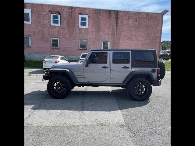 used 2015 Jeep Wrangler Unlimited car, priced at $23,067