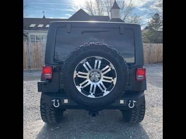 used 2011 Jeep Wrangler Unlimited car, priced at $16,489