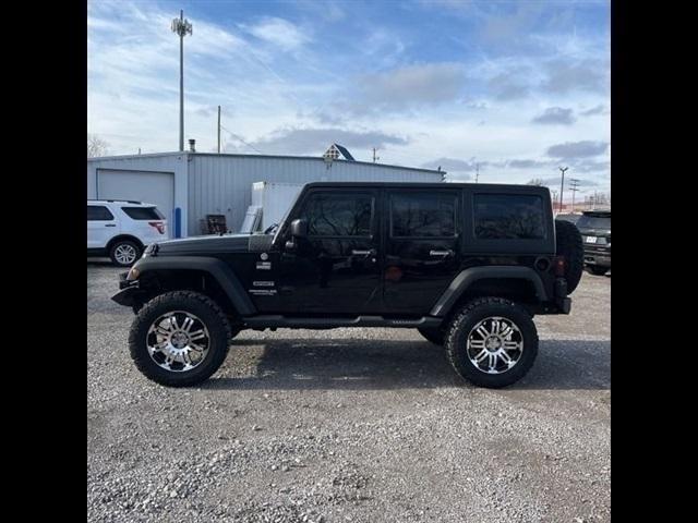 used 2011 Jeep Wrangler Unlimited car, priced at $16,489