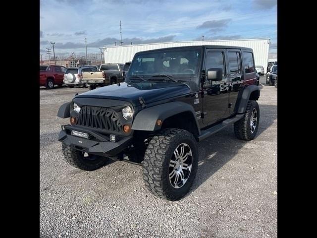 used 2011 Jeep Wrangler Unlimited car, priced at $16,489