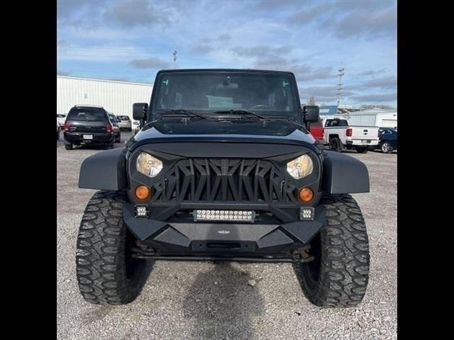 used 2011 Jeep Wrangler Unlimited car, priced at $16,489