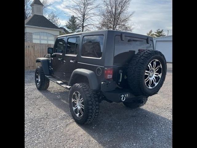 used 2011 Jeep Wrangler Unlimited car, priced at $16,489