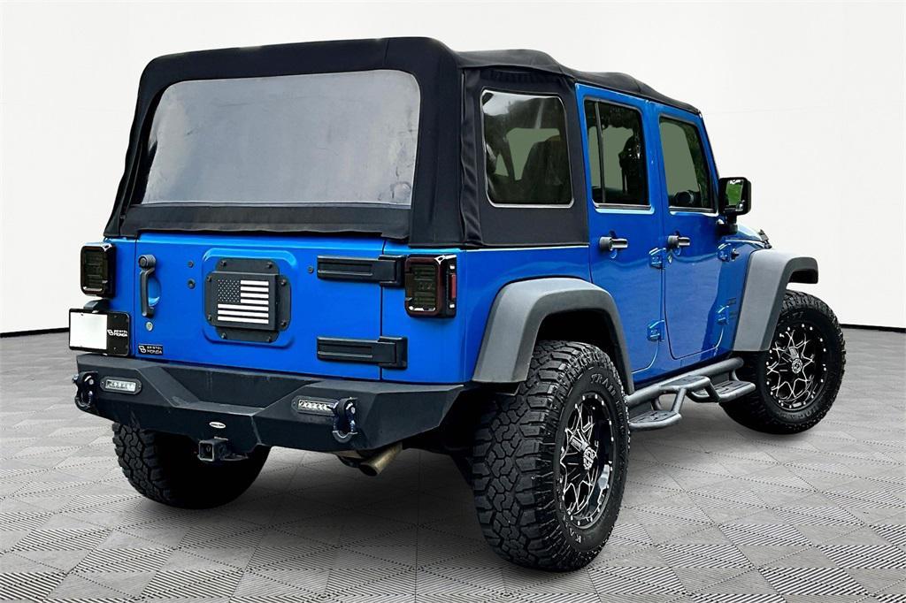 used 2015 Jeep Wrangler Unlimited car, priced at $17,975