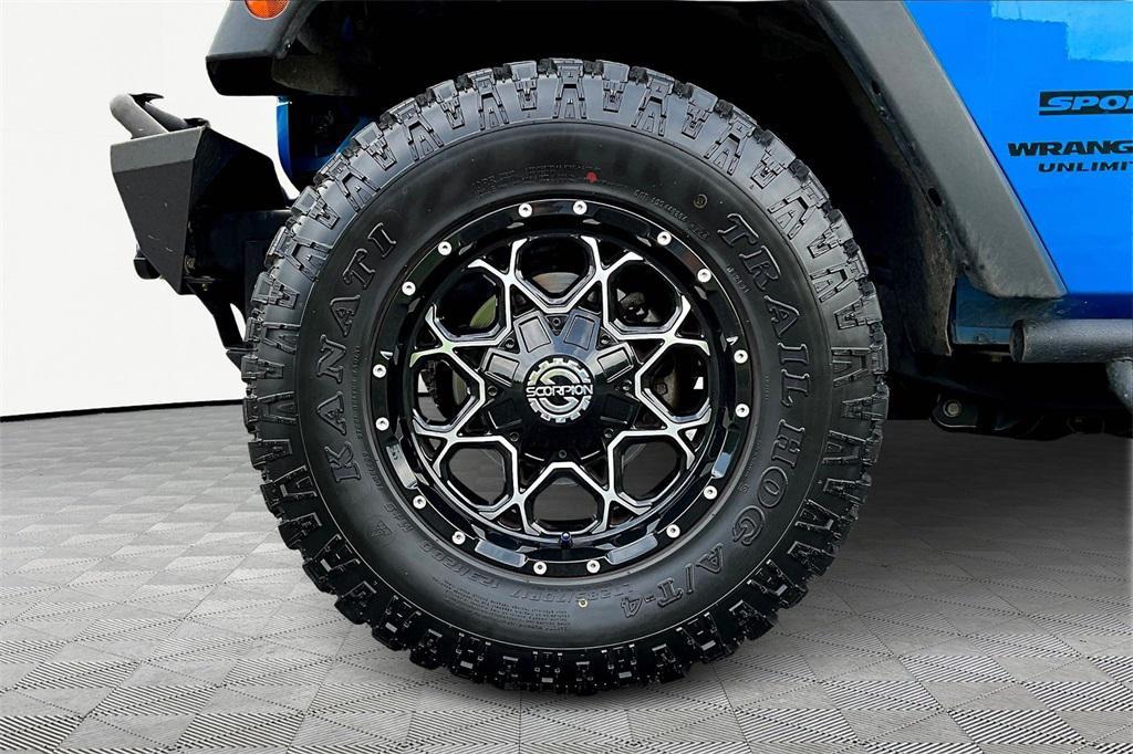used 2015 Jeep Wrangler Unlimited car, priced at $17,975