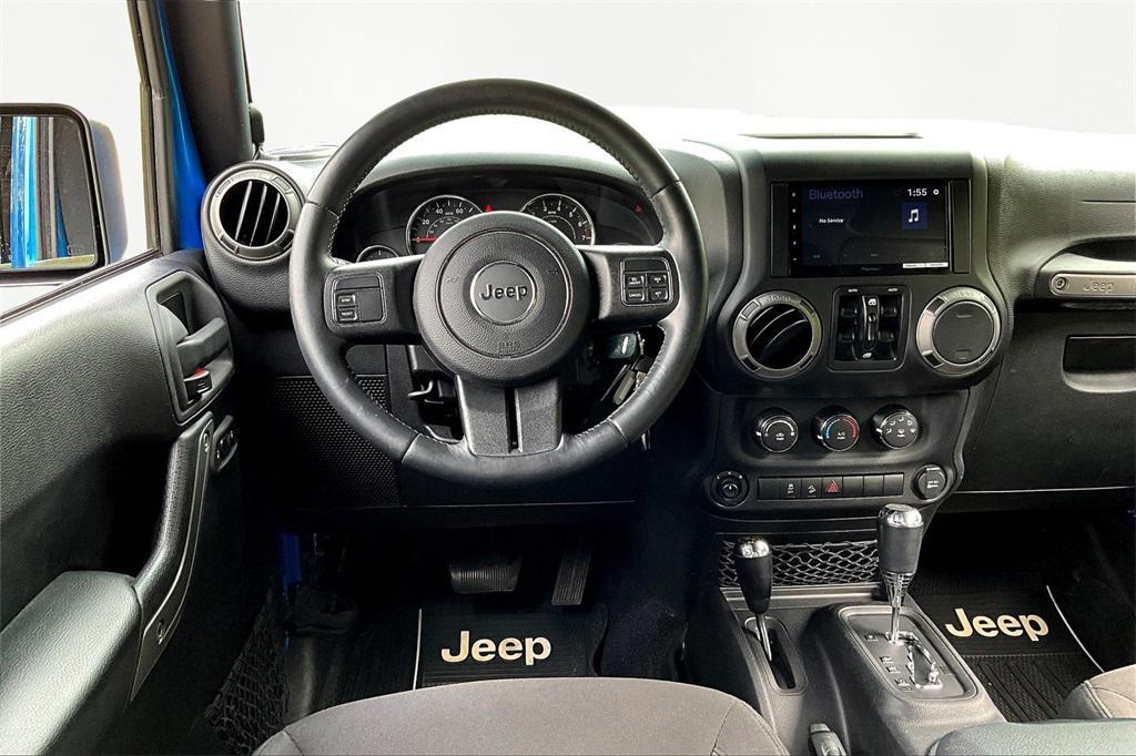 used 2015 Jeep Wrangler Unlimited car, priced at $17,975