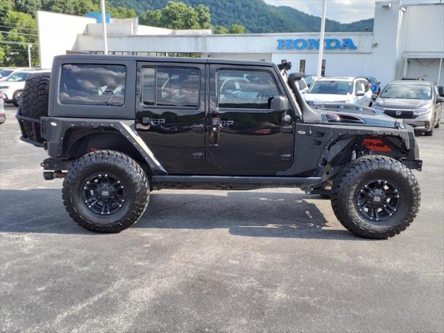 used 2017 Jeep Wrangler Unlimited car, priced at $33,741