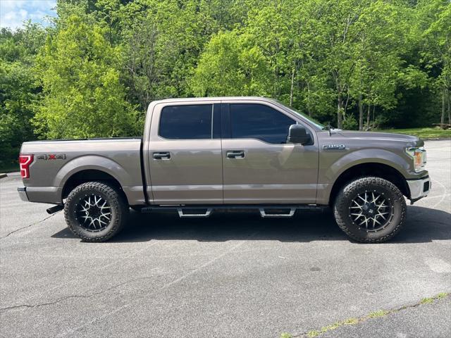 used 2018 Ford F-150 car, priced at $28,620