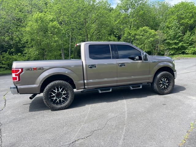used 2018 Ford F-150 car, priced at $28,620