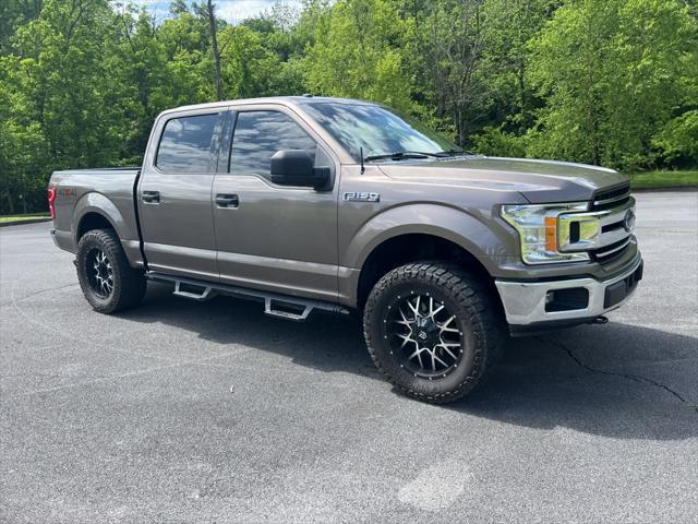 used 2018 Ford F-150 car, priced at $28,620