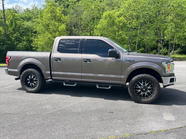 used 2018 Ford F-150 car, priced at $28,620