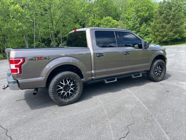 used 2018 Ford F-150 car, priced at $28,620