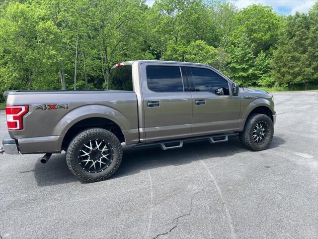 used 2018 Ford F-150 car, priced at $28,620