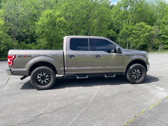 used 2018 Ford F-150 car, priced at $28,620