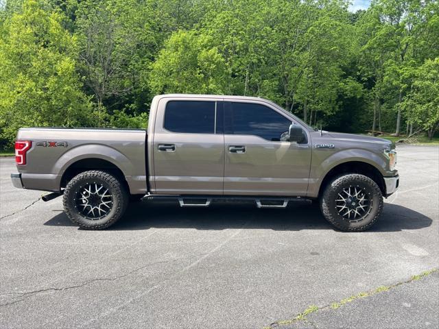 used 2018 Ford F-150 car, priced at $28,620