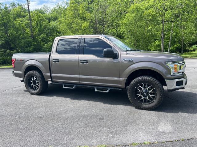 used 2018 Ford F-150 car, priced at $28,620