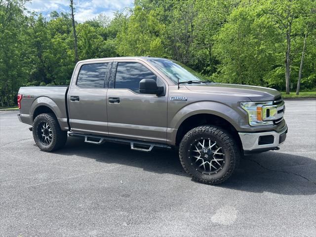 used 2018 Ford F-150 car, priced at $28,620
