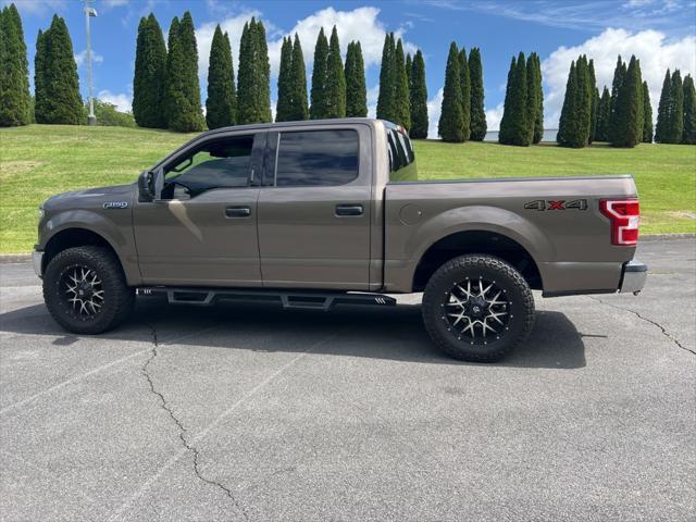 used 2018 Ford F-150 car, priced at $28,620