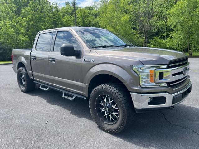 used 2018 Ford F-150 car, priced at $28,620