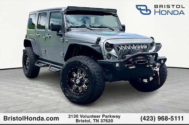 used 2016 Jeep Wrangler Unlimited car, priced at $23,069