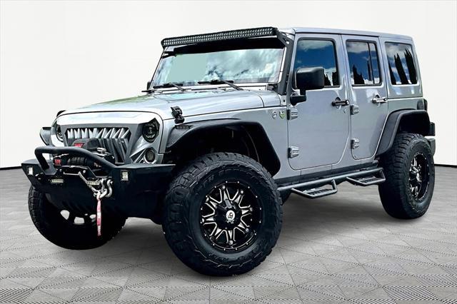 used 2016 Jeep Wrangler Unlimited car, priced at $23,069