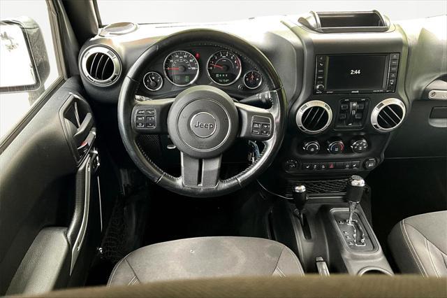 used 2016 Jeep Wrangler Unlimited car, priced at $23,069