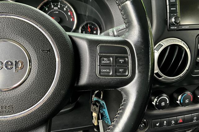 used 2016 Jeep Wrangler Unlimited car, priced at $23,069