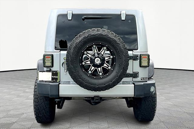 used 2016 Jeep Wrangler Unlimited car, priced at $23,069