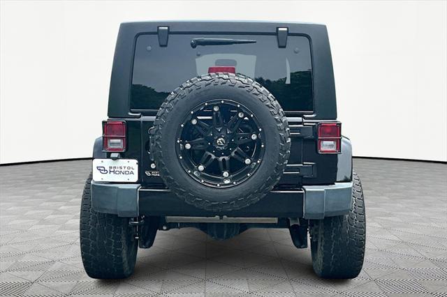 used 2016 Jeep Wrangler Unlimited car, priced at $22,771