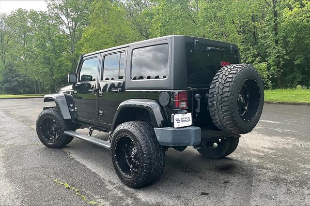 used 2016 Jeep Wrangler Unlimited car, priced at $23,750