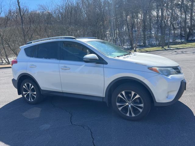 used 2015 Toyota RAV4 car, priced at $13,299