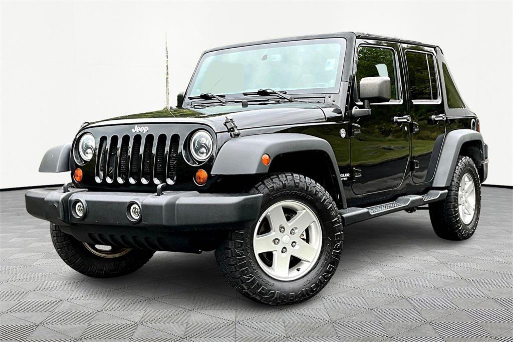 used 2013 Jeep Wrangler Unlimited car, priced at $15,980