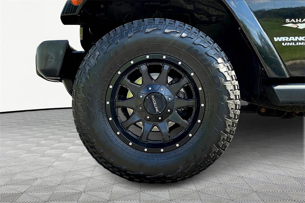 used 2012 Jeep Wrangler Unlimited car, priced at $18,859
