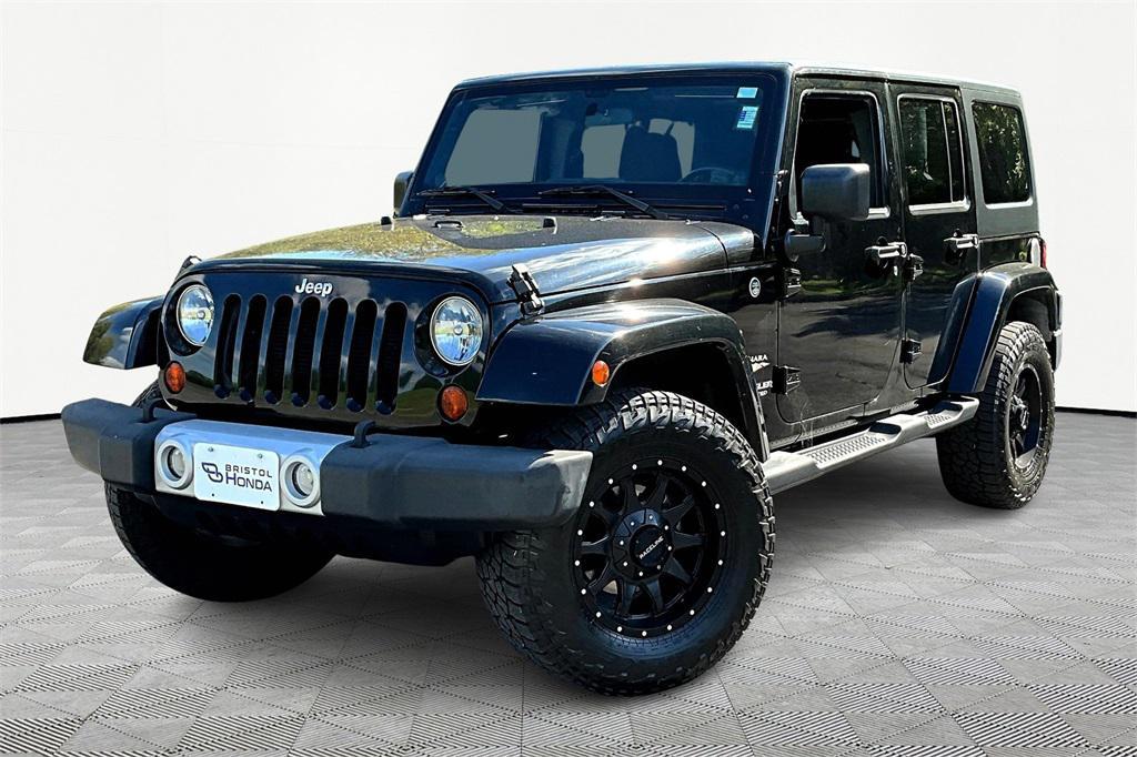 used 2012 Jeep Wrangler Unlimited car, priced at $18,859