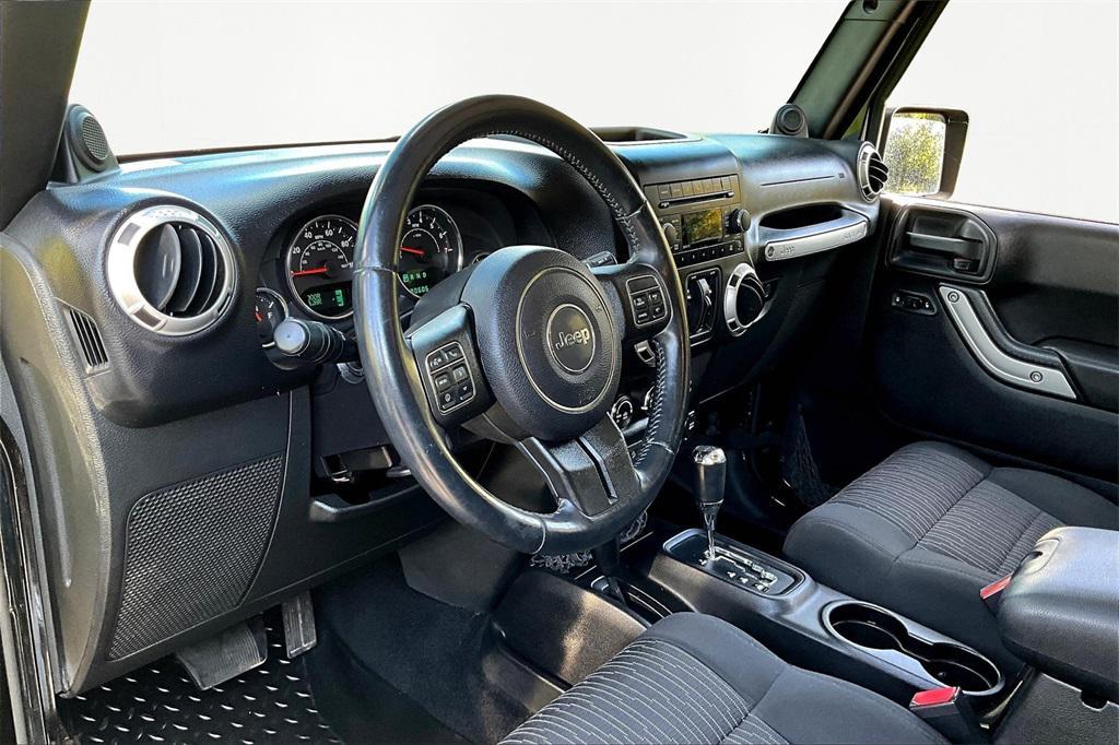 used 2012 Jeep Wrangler Unlimited car, priced at $18,859