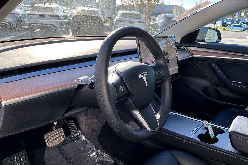 used 2023 Tesla Model 3 car, priced at $24,874
