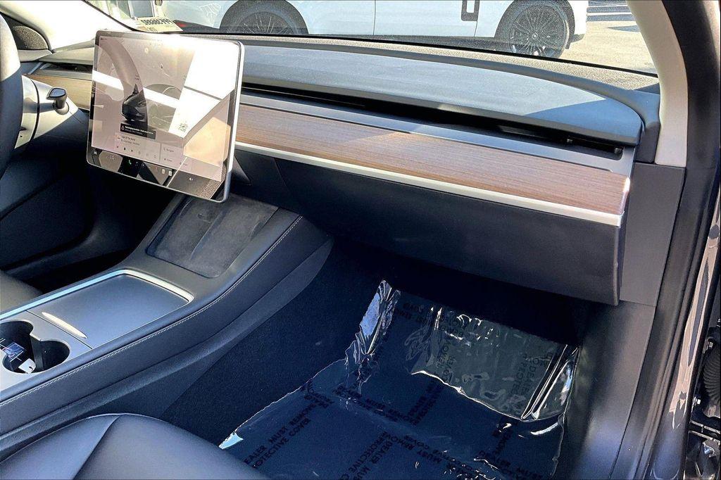 used 2023 Tesla Model 3 car, priced at $24,874