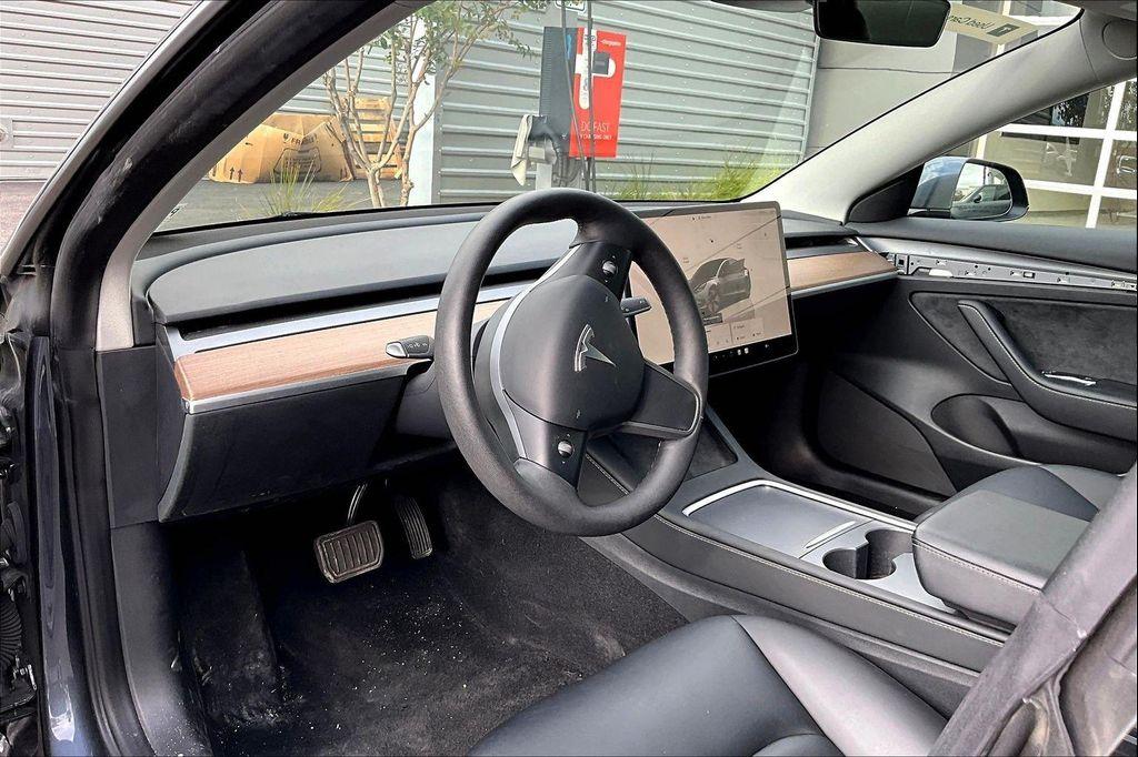 used 2023 Tesla Model 3 car, priced at $25,442