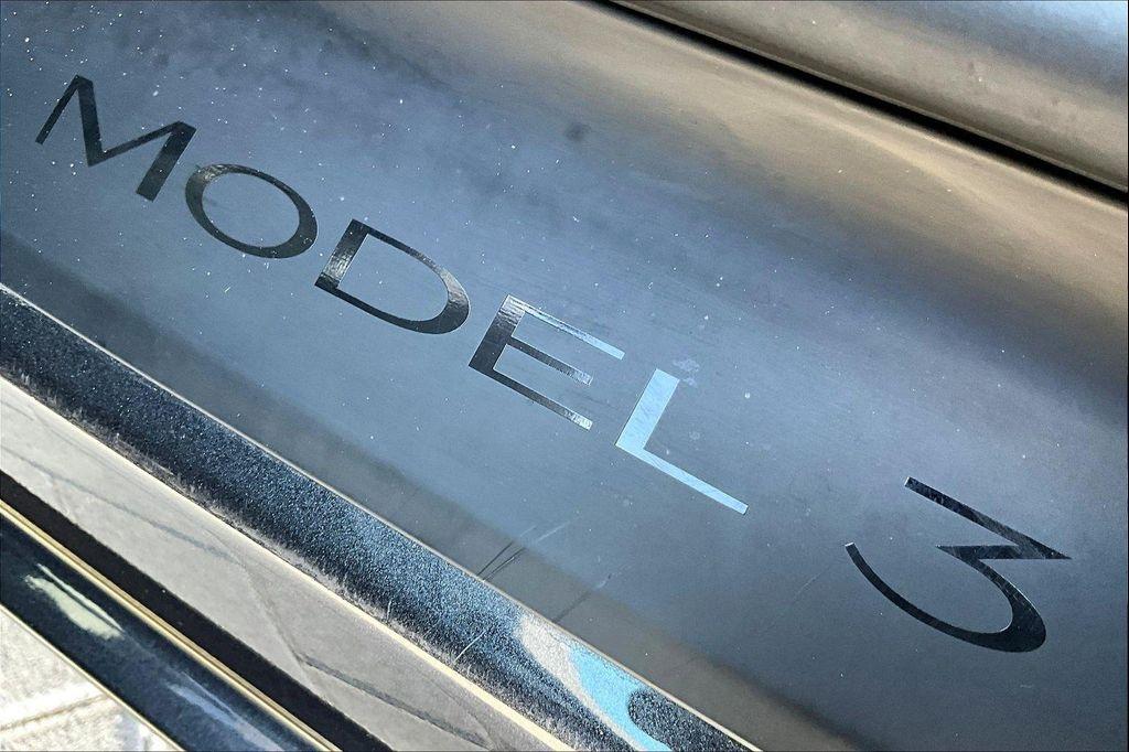 used 2025 Tesla Model 3 car, priced at $39,661