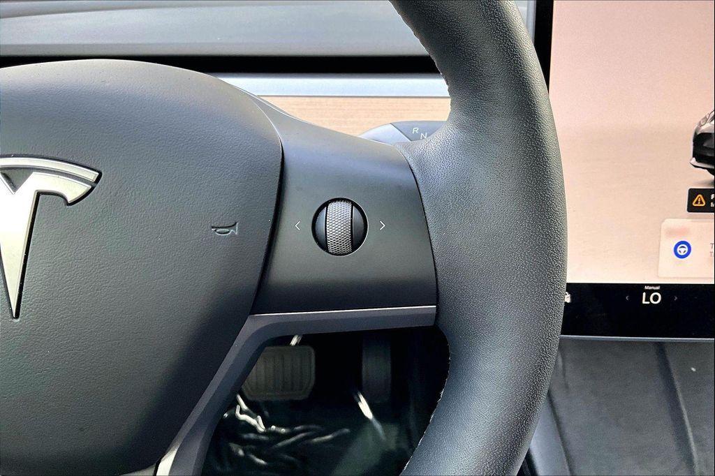 used 2023 Tesla Model 3 car, priced at $25,773