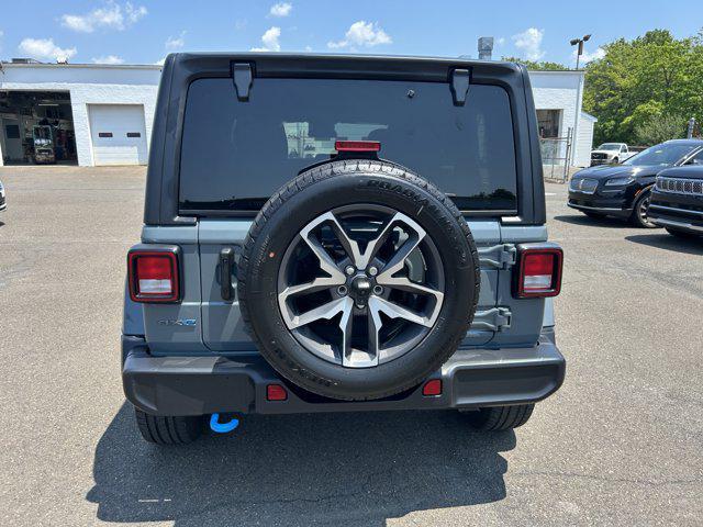 used 2024 Jeep Wrangler 4xe car, priced at $36,890