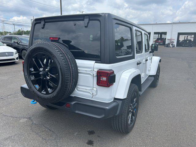 used 2022 Jeep Wrangler Unlimited 4xe car, priced at $33,890