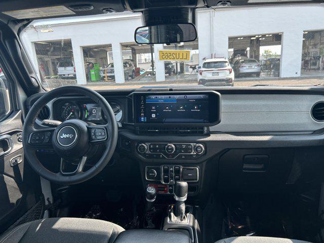 used 2024 Jeep Wrangler 4xe car, priced at $36,890