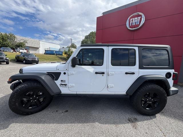used 2021 Jeep Wrangler Unlimited car, priced at $27,497