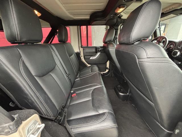 used 2016 Jeep Wrangler Unlimited car, priced at $19,497