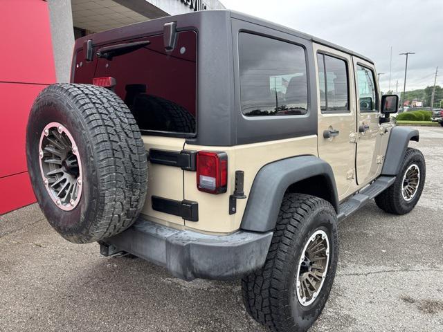used 2016 Jeep Wrangler Unlimited car, priced at $19,497