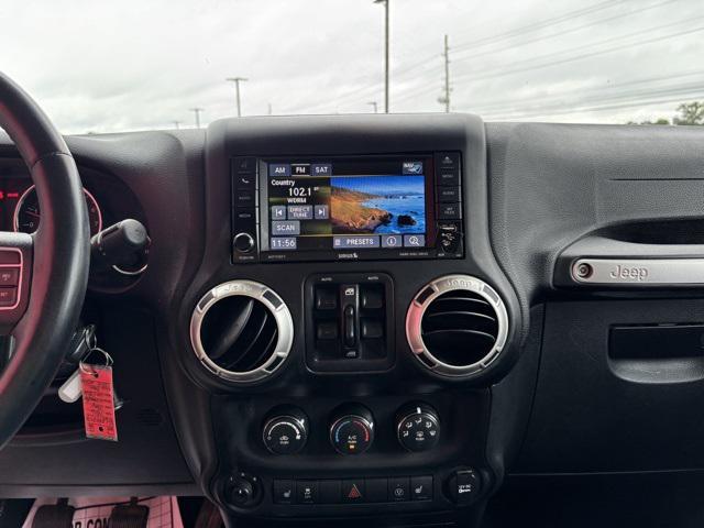 used 2016 Jeep Wrangler Unlimited car, priced at $19,497