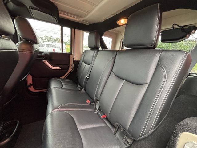 used 2016 Jeep Wrangler Unlimited car, priced at $19,497