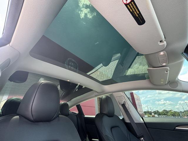 used 2023 Tesla Model 3 car, priced at $28,497