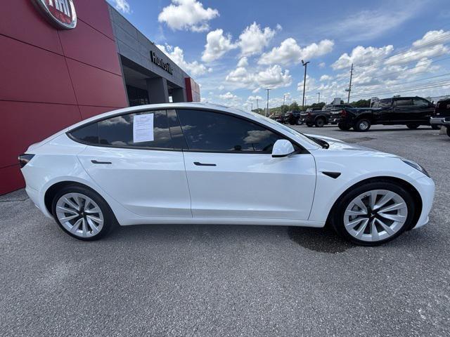 used 2023 Tesla Model 3 car, priced at $28,497